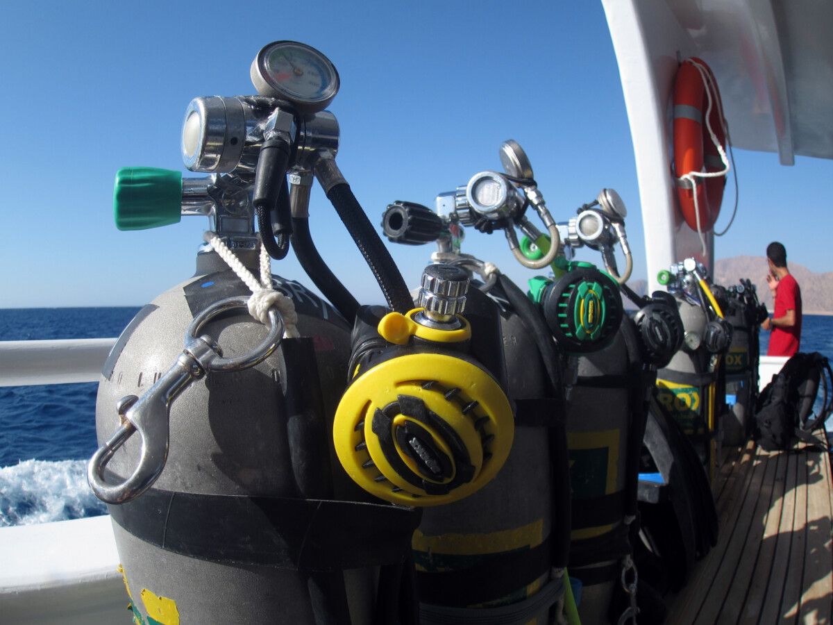 A diver wearing a tank and breathing nitrox